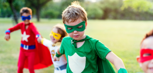 children dressed as superheroes
